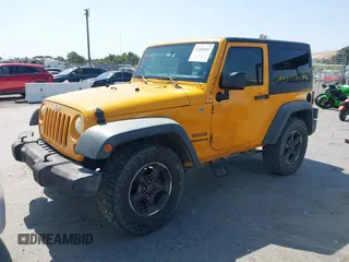 2012 Jeep Wrangler Sport with VIN 1C4AJWAG1CL286332, listed as a IAAI auction lot 42408102 with 169,204 mi miles and . Bid and sale history available at DreamBid. Image 2.