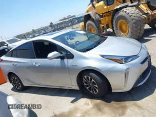 2022 Toyota Prius L Eco with VIN JTDKAMFU5N3188107, listed as a IAAI auction lot 42223649 with 180,894 mi miles and . Bid and sale history available at DreamBid. Image 14.