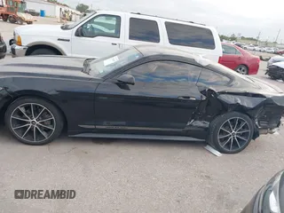 2016 Ford Mustang EcoBoost z VIN 1FA6P8THXG5267039, wystawiony jako IAAI lot #42014319 z przebiegiem 103 936 mil mil oraz . Historia ofert i sprzedaży dostępna na DreamBid. Obrazek 15.