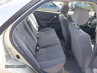 2001 Toyota Camry LE z VIN JT2BF22KX10342454, wystawiony jako IAAI lot #41939743 z przebiegiem 124 045 mil mil oraz . Historia ofert i sprzedaży dostępna na DreamBid. Obrazek 8.
