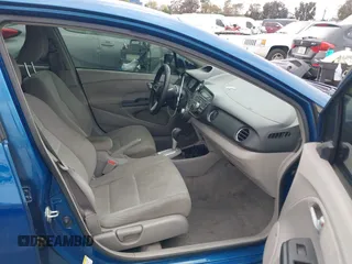 2012 Honda Insight LX with VIN JHMZE2H58CS001411, listed as a IAAI auction lot 42148575 with 155,586 mi miles and . Bid and sale history available at DreamBid. Image 5.