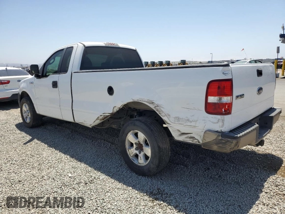 2005 Ford F-150 XL with VIN 1FTRF12255NB53669, listed as a Copart auction lot 61636135 with 156,562 mi miles and Salvage title. Bid and sale history available at DreamBid. Image 2.