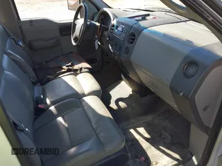 2007 Ford F-150 XL with VIN 1FTRF12W77NA83372, listed as a IAAI auction lot 41628051 with 104,564 mi miles and . Bid and sale history available at DreamBid. Image 5.