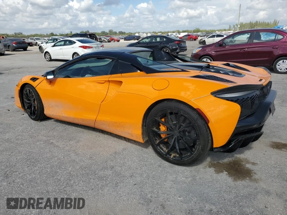 2025 McLaren Artura z VIN SBM16BEA8SW002943, wystawiony jako Copart lot #43462325 z przebiegiem Nie podano mil oraz Szkody całkowita. Historia ofert i sprzedaży dostępna na DreamBid. Obrazek 2.