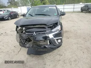 2019 Mitsubishi Outlander ES z VIN JA4AR3AU5KU028749, wystawiony jako Copart lot #52692835 z przebiegiem 122 439 mil mil oraz Szkoda całkowita • Salvage title. Historia ofert i sprzedaży dostępna na DreamBid. Obrazek 11.