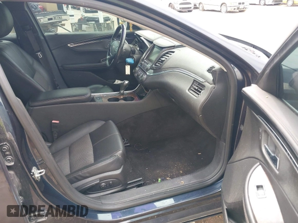 2014 Chevrolet Impala LT with VIN 2G1115SLXE9222573, listed as a IAAI auction lot 42119082 with 147,011 mi miles and . Bid and sale history available at DreamBid. Image 5.