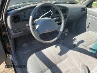 1994 Toyota Pickup DX z VIN JT4RN01P8R7065882, wystawiony jako Copart lot #56998705 z przebiegiem 86 406 mil mil oraz Czysty tytuł • Clean title. Historia ofert i sprzedaży dostępna na DreamBid. Obrazek 8.