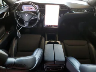 2018 Tesla Model S 75D with VIN 5YJSA1E21JF282786, listed as a Copart auction lot 58058595 with 65,982 mi miles and Salvage title. Bid and sale history available at DreamBid. Image 8.