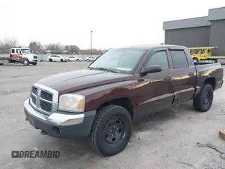 2005 Dodge Dakota SLT with VIN 1D7HW48N95S298672, listed as a IAAI auction lot 41765025 with 291,447 mi miles. Bid and sale history available at carsss.com. Image 2.