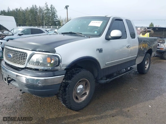 2000 Ford F-150 XL with VIN 1FTRX18L8YKA72409, listed as a IAAI auction lot 41928360 with 167,251 mi miles. Bid and sale history available at carsss.com. Image 2.