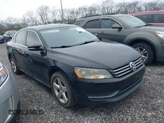 2013 Volkswagen Passat SE w/Sunroof with VIN 1VWBP7A33DC075802, listed as a IAAI auction lot 41957948 with 217,562 mi miles. Bid and sale history available at carsss.com. Image 1.