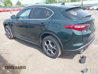 2018 Alfa Romeo Stelvio z VIN ZASFAKAN7J7B99545, wystawiony jako IAAI lot #42117271 z przebiegiem 49 368 mil mil oraz . Historia ofert i sprzedaży dostępna na DreamBid. Obrazek 3.