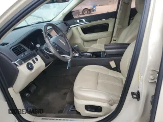 2014 Lincoln MKS with VIN 1LNHL9DKXEG612758, listed as a Copart auction lot 53230065 with 98,863 mi miles and Salvage Title. Bid and sale history available at carsss.com. Image 7.