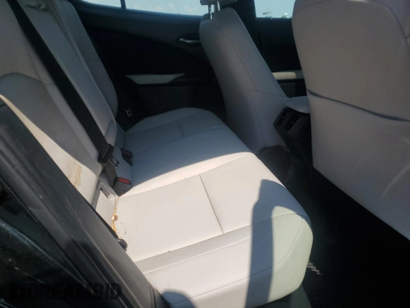 2023 Lexus UX 250h Premium с VIN JTHP9JBHXP2070096, выставлен на аукционе Copart как лот 65645035 с пробегом 9 748 миль миль и Списание • Salvage title. История ставок и продаж доступна на DreamBid. Изображение 10.