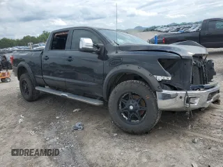 2016 Nissan Titan SL z VIN 1N6BA1F22GN504550, wystawiony jako Copart lot #56616955 z przebiegiem 176 020 mil mil oraz Szkoda całkowita • Salvage title. Historia ofert i sprzedaży dostępna na DreamBid. Obrazek 4.