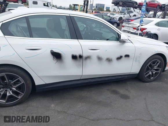 2024 BMW i5 eDrive40 with VIN WBY33FK03RCR99079, listed as a IAAI auction lot 42028540 with 28,827 mi miles and . Bid and sale history available at DreamBid. Image 6.