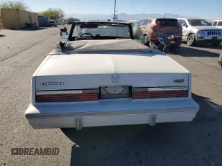1982 Chrysler LeBaron z VIN 1C3BC55D3CG173312, wystawiony jako Copart lot #80800174 z przebiegiem 48 391 mil mil oraz Tytuł czysty. Historia ofert i sprzedaży dostępna na DreamBid. Obrazek 6.