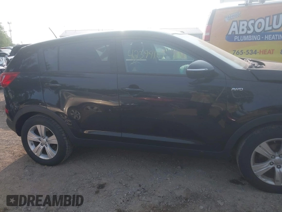 2013 Kia Sportage LX z VIN KNDPBCA27D7451269, wystawiony jako IAAI lot #42399187 z przebiegiem 119 507 mil mil oraz . Historia ofert i sprzedaży dostępna na DreamBid. Obrazek 13.