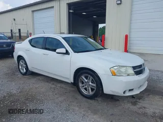 2009 Dodge Avenger SXT with VIN 1B3LC56B59N561791, listed as a IAAI auction lot 42607605 with 287,201 mi miles and . Bid and sale history available at DreamBid. Image 1.