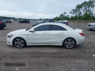 2014 Mercedes-Benz CLA 250 with VIN WDDSJ4EBXEN052730, listed as a IAAI auction lot 42653232 with 152,303 mi miles and . Bid and sale history available at DreamBid. Image 14.
