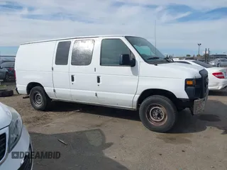 2012 Ford Econoline Cargo Commercial with VIN 1FTNE1EW0CDB06455, listed as a IAAI auction lot 41666172 with 270,816 mi miles and . Bid and sale history available at carsss.com. Image 13.