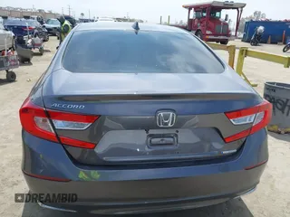 2020 Honda Accord with VIN 1HGCV3F11LA015901, listed as a IAAI auction lot 42022659 with 131,865 mi miles and . Bid and sale history available at DreamBid. Image 16.