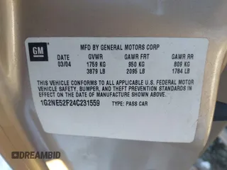 2004 Pontiac Grand Am SE with VIN 1G2NE52F24C231559, listed as a IAAI auction lot 41606544 with 65,524 mi miles. Bid and sale history available at carsss.com. Image 9.