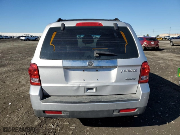 2010 Mazda Tribute Sport with VIN 4F2CY9C7XAKM03394, listed as a Copart auction lot 47975075 with 145,286 mi miles and Salvage Title. Bid and sale history available at carsss.com. Image 6.