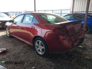 2009 Pontiac G6 1SB with VIN 1G2ZJ57KX94259078, listed as a IAAI auction lot 41223904 with 129,681 mi miles and . Bid and sale history available at DreamBid. Image 3.