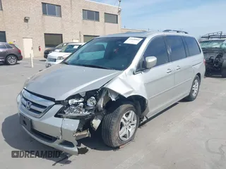 2006 Honda Odyssey EX-L z VIN 5FNRL38736B089963, wystawiony jako IAAI lot #41858061 z przebiegiem 178 845 mil mil oraz . Historia ofert i sprzedaży dostępna na DreamBid. Obrazek 6.