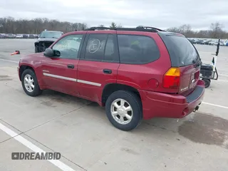 2006 GMC Envoy SLE with VIN 1GKDT13S262175296, listed as a IAAI auction lot 41866248 with 249,830 mi miles. Bid and sale history available at carsss.com. Image 3.