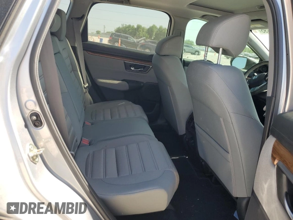 2019 Honda CR-V EX z VIN 5J6RW1H52KA016199, wystawiony jako Copart lot #52747495 z przebiegiem 48 375 mil mil oraz Czysty tytuł • Clean title. Historia ofert i sprzedaży dostępna na DreamBid. Obrazek 11.