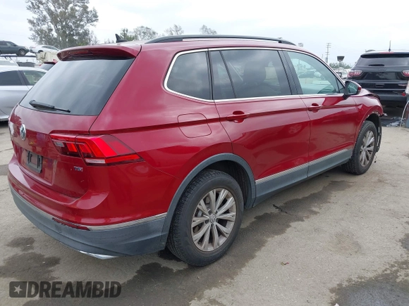 2018 Volkswagen Tiguan SEL with VIN 3VV3B7AX9JM031453, listed as a IAAI auction lot 42084781 with 82,931 mi miles and . Bid and sale history available at DreamBid. Image 4.