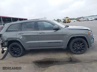 2021 Jeep Grand Cherokee Laredo X with VIN 1C4RJEAG4MC597302, listed as a IAAI auction lot 41919123 with 63,849 mi miles. Bid and sale history available at carsss.com. Image 13.