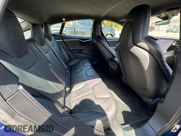 2016 Tesla Model S 90D with VIN 5YJSA1E29GF153669, listed as a Copart auction lot 63765555 with 87,476 mi miles and Clean title. Bid and sale history available at DreamBid. Image 6.