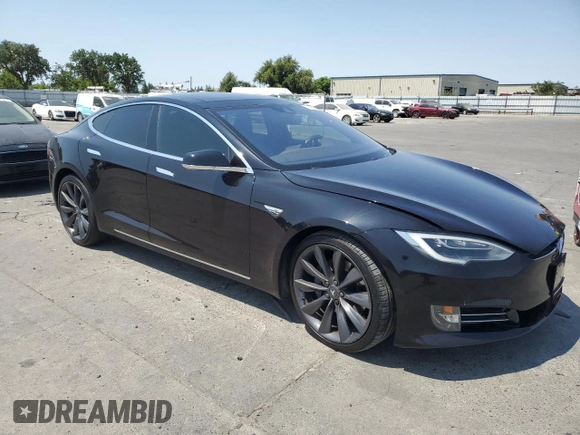 2016 Tesla Model S 90D z VIN 5YJSA1E29GF158774, wystawiony jako Copart lot #60143405 z przebiegiem Nie podano mil oraz Szkoda całkowita • Salvage title. Historia ofert i sprzedaży dostępna na DreamBid. Obrazek 4.