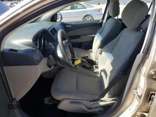 2010 Dodge Caliber SXT z VIN 1B3CB4HA7AD571525, wystawiony jako Copart lot #61651405 z przebiegiem 188 383 mil mil oraz Czysty tytuł • Clean title. Historia ofert i sprzedaży dostępna na DreamBid. Obrazek 7.