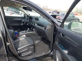 2018 Mazda CX-5 Touring with VIN JM3KFBCMXJ0438177, listed as a IAAI auction lot 42152275 with 65,434 mi miles and . Bid and sale history available at carsss.com. Image 5.