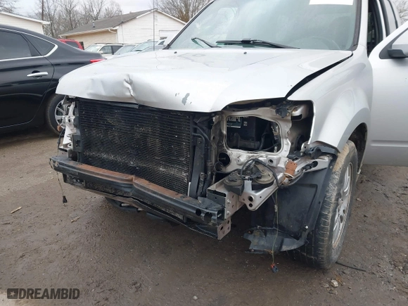 2010 Mercury Mariner Premier with VIN 4M2CN8HG4AKJ02111, listed as a IAAI auction lot 41423963 with 246,600 mi miles. Bid and sale history available at carsss.com. Image 6.
