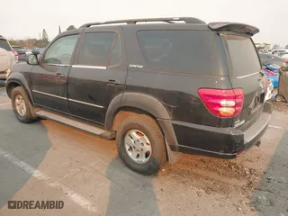 2002 Toyota Sequoia Limited with VIN 5TDZT38A32S065230, listed as a IAAI auction lot 41290794 with 306,444 mi miles. Bid and sale history available at carsss.com. Image 3.