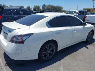2014 Nissan Maxima SV with VIN 1N4AA5AP4EC907890, listed as a IAAI auction lot 42710257 with 125,659 mi miles and . Bid and sale history available at DreamBid. Image 4.