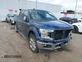 2019 Ford F-150 XL with VIN 1FTEW1E48KKD81142, listed as a IAAI auction lot 41753077 with 56,106 mi miles. Bid and sale history available at carsss.com. Image 1.
