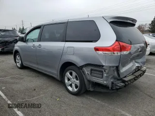2012 Toyota Sienna with VIN 5TDKA3DC4CS014867, listed as a Copart auction lot 43191655 with 169,517 mi miles and Salvage Title. Bid and sale history available at DreamBid. Image 2.
