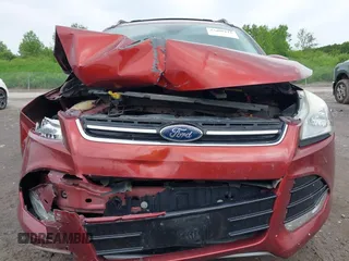 2015 Ford Escape Titanium z VIN 1FMCU9J98FUC84963, wystawiony jako IAAI lot #42469112 z przebiegiem 128 838 mil mil oraz . Historia ofert i sprzedaży dostępna na DreamBid. Obrazek 12.