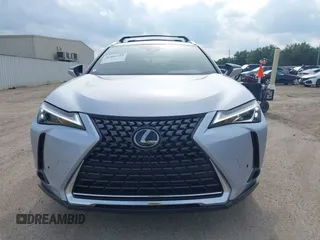 2023 Lexus UX 250h Premium z VIN JTHP6JBH5P2145912, wystawiony jako IAAI lot #42401353 z przebiegiem 14 252 mil mil oraz . Historia ofert i sprzedaży dostępna na DreamBid. Obrazek 12.