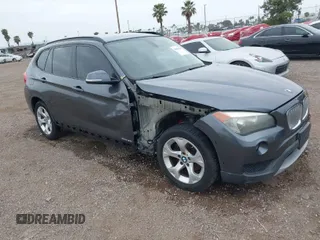 2013 BMW X1 28i with VIN WBAVM1C51DVW42577, listed as a IAAI auction lot 42029627 with 140,343 mi miles. Bid and sale history available at carsss.com. Image 1.