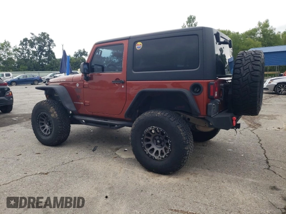2014 Jeep Wrangler Rubicon with VIN 1C4BJWCG2EL303420, listed as a Copart auction lot 63550985 with 87,175 mi miles and Salvage title. Bid and sale history available at DreamBid. Image 2.
