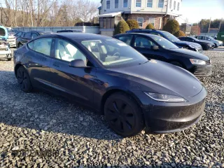 2024 Tesla Model 3 with VIN 5YJ3E1EA2RF859983, listed as a Copart auction lot 48044865 with 2,277 mi miles and Salvage Title. Bid and sale history available at DreamBid. Image 4.