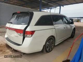 2017 Honda Odyssey Touring with VIN 5FNRL5H94HB007979, listed as a Copart auction lot 56755435 with 125,821 mi miles and Salvage title. Bid and sale history available at DreamBid. Image 3.