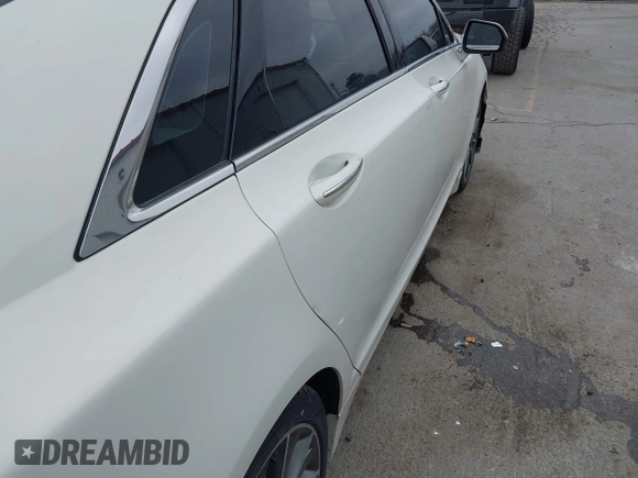 2013 Lincoln MKZ z VIN 3LN6L2GK9DR811737, wystawiony jako IAAI lot #42011896 z przebiegiem 100 669 mil mil oraz . Historia ofert i sprzedaży dostępna na DreamBid. Obrazek 12.